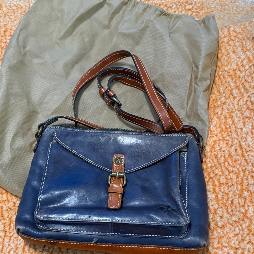 Patricia Nash Classic Navy Leather Crossbody Bag with Brown Trim